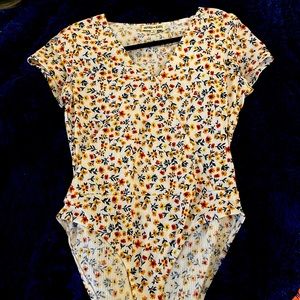 *NEW* bodysuit white w/ yellow and orange small  flowers L bodysuit never worn